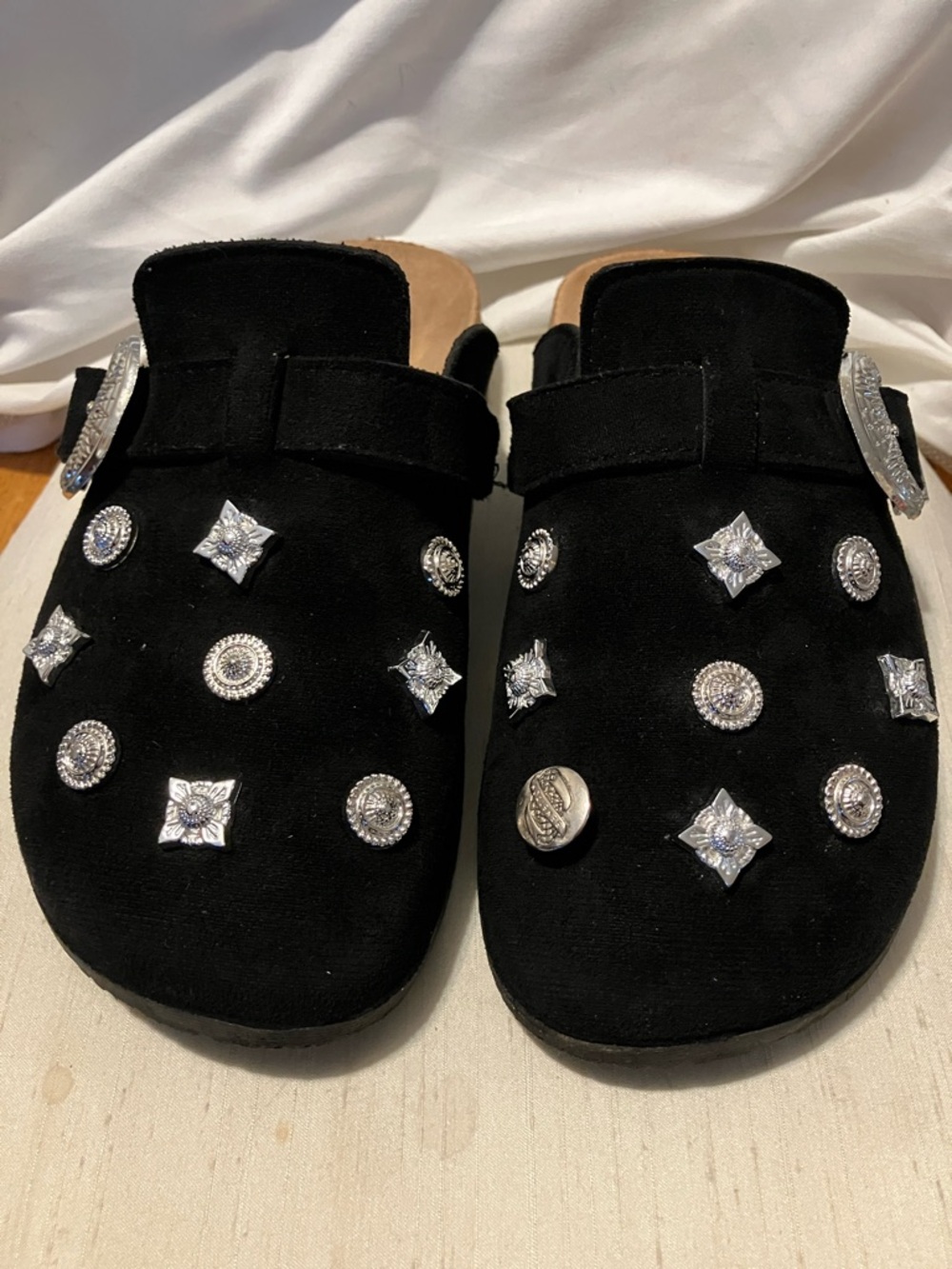 Black suede slip ons. Sz 9 with silver decor.  Awesome condition ,